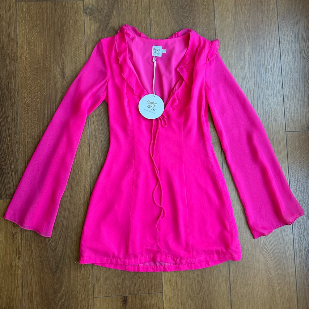 Princess Polly 70’s Hot Pink Mini Dress with long sleeves.